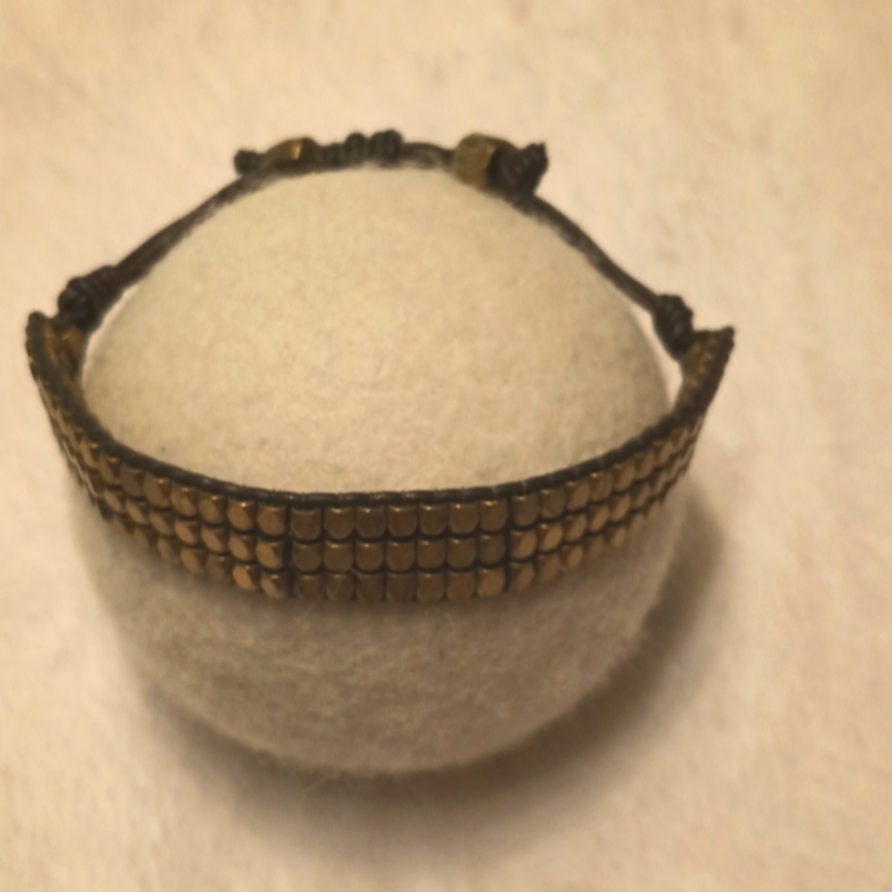 Adjustable leather and brass bracelet
